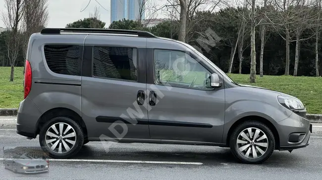 سيارة FİAT DOBLO 1.6 PREMİO PLUS موديل 2022  بدون عيوب مع فاتورة %20  منKARDEM AUTO