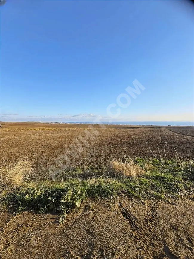 A plot of land with an area of 280 square meters overlooking the sea in ÇEŞMELİ from SILA.