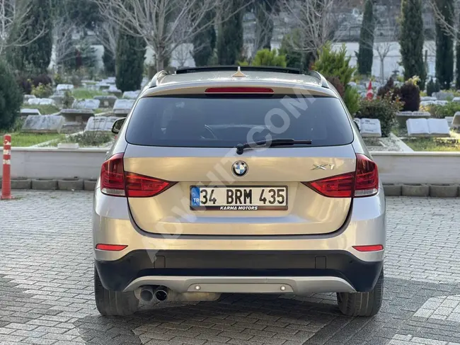 سيارة BMW X1 موديل 2014 بدون عيوب 88 ألف كيلو متر سقف زجاجي