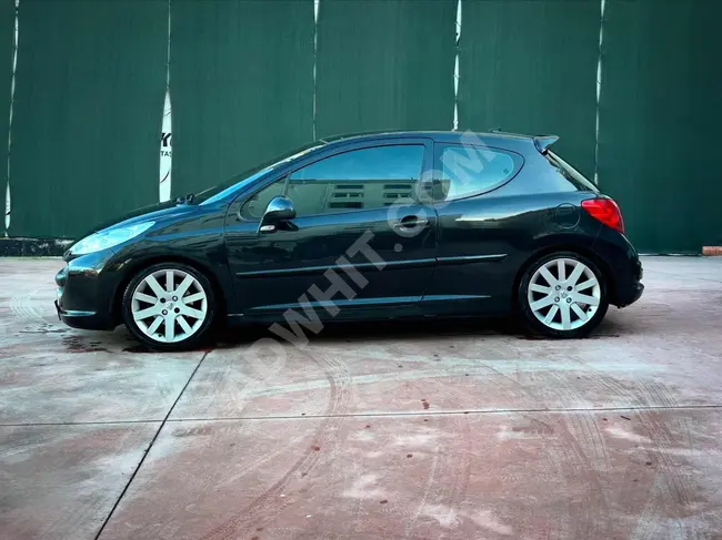 Peugeot 207 car well-maintained with a glass roof