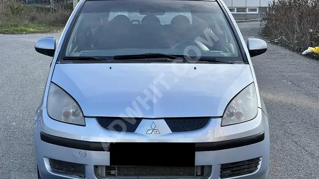 سيارة Mitsubishi Colt عداد  291 ألف فتحة سقف وإمكانية الدفع بالأقساط عبر البطاقة.