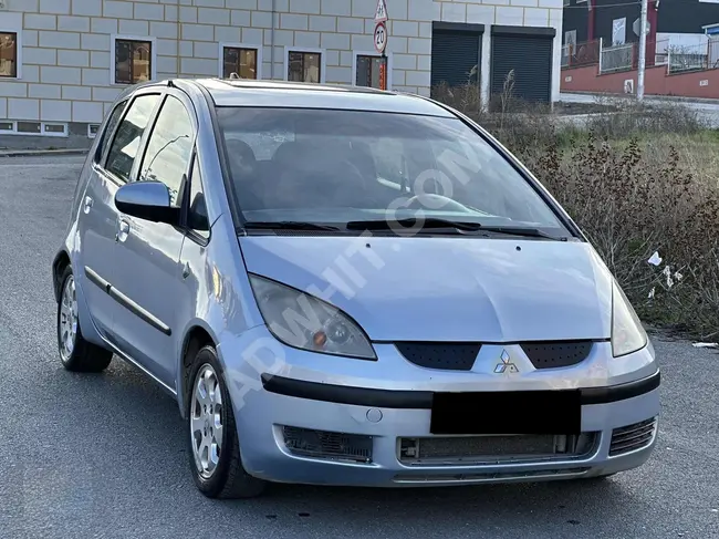 سيارة Mitsubishi Colt عداد  291 ألف فتحة سقف وإمكانية الدفع بالأقساط عبر البطاقة.