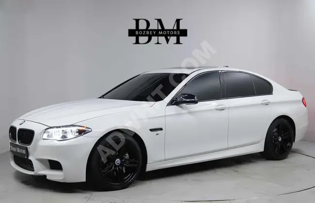 سيارة BMW M550 XDrive موديل 2015 مع نظام شفط + شاشة NBT + تدفئة + تكييف من BOZBEY