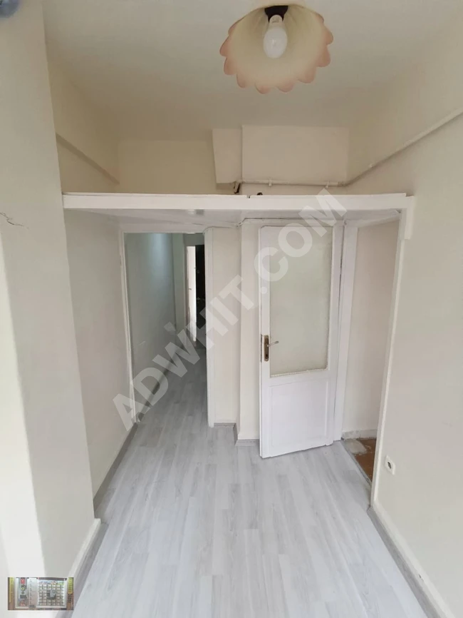 1+1 apartment on the middle floor, with an area of 60 square meters, on Huccet Street next to Fatih Odabaşı.