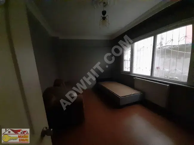 1+1 apartment on the garden floor for rent at a price of 12,000 Lira in BASINSİTESİ