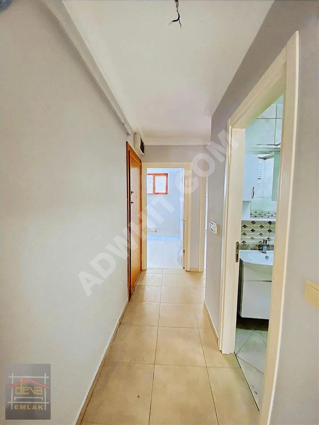 2+1 apartment in a new building without slopes, located 2 minutes from MARMARAY station in DEVADAN UNCULAR