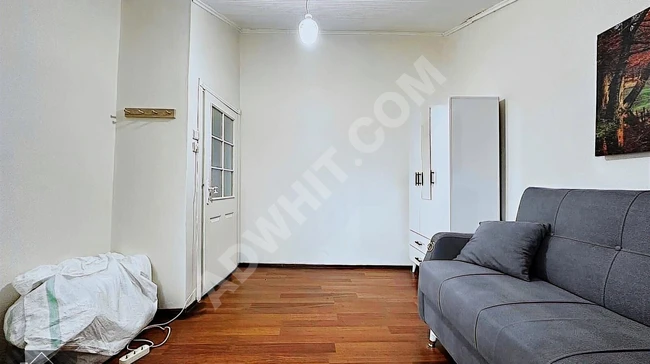 1+1 apartment with no fees and parking, built in 1999, for sale.