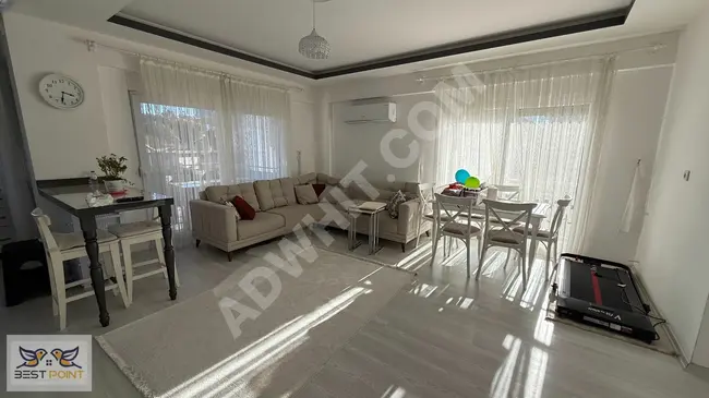 A modern and elegant furnished 2+1 apartment within a complex with a pool in Belek Merkez.