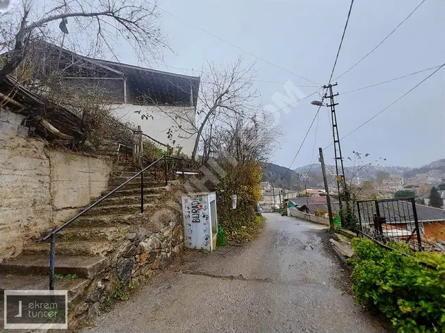 A two-story building on a 450 square meter plot near the center in the BEYKOZ TOKATKÖY neighborhood.