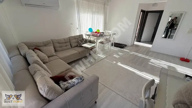 A modern and elegant furnished 2+1 apartment within a complex with a pool in Belek Merkez.