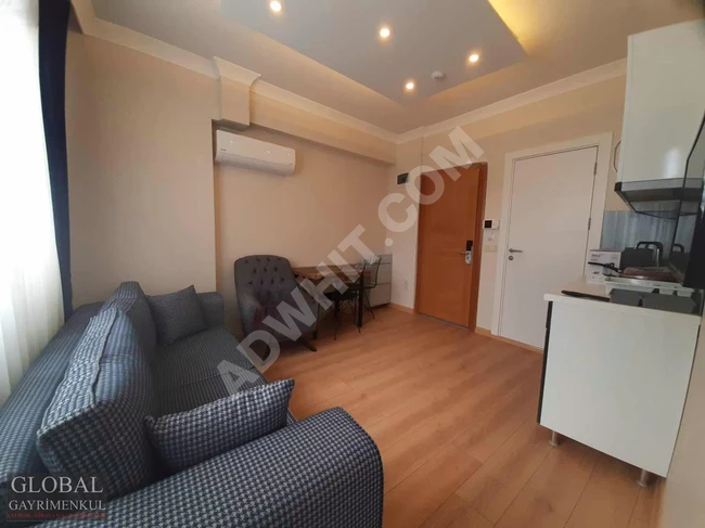 1+1 furnished apartment on the middle floor, including bills, opposite NUROL TOWER