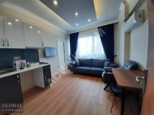 1+1 furnished apartment on the middle floor, including bills, opposite NUROL TOWER