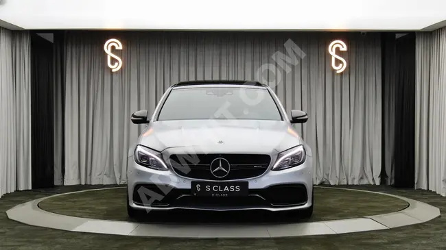 MERCEDES C63 S AMG car, 2015 model with 510 horsepower in matte gray color.