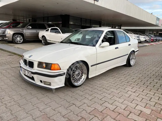 سيارة BMW 3.20i M50