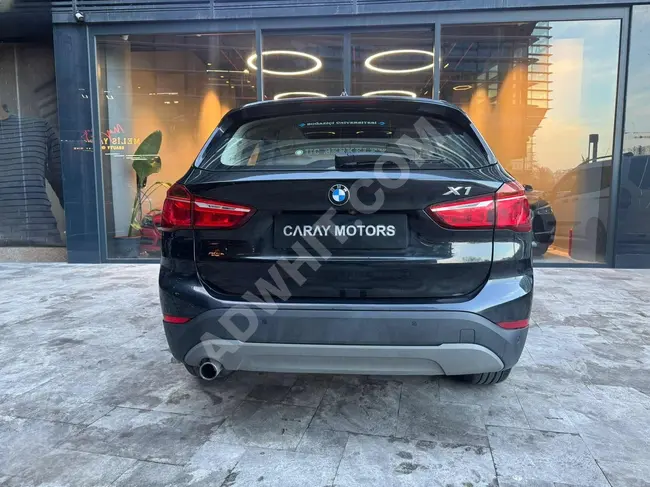 سيارة BMW X1 18İ S DRİVE موديل 2016 - سقف زجاجي - بدون عيوب