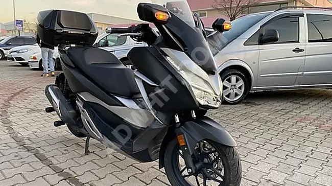 دراجة نارية Honda Forza 250 بلا أخطاء