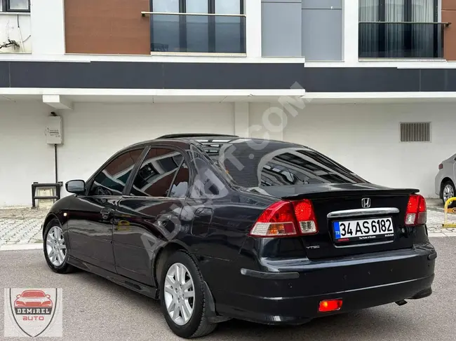 The HONDA CIVIC car, model 2006, equipped with an automatic sunroof and maintained by DEMİREL AUTO.