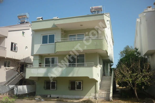 10+2 villa for sale with swimming pool, covering an area of 610 m2 within a complex located in the Mersin Mezitli area.