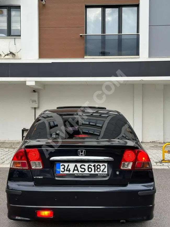 The HONDA CIVIC car, model 2006, equipped with an automatic sunroof and maintained by DEMİREL AUTO.