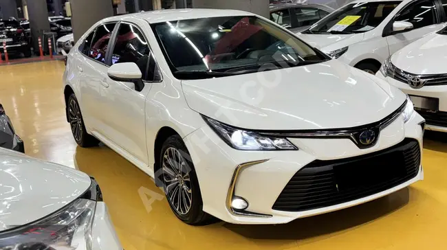 TOYOTA COROLLA HYBRID without defects, paint, or accident history - AUTO BOGATIM