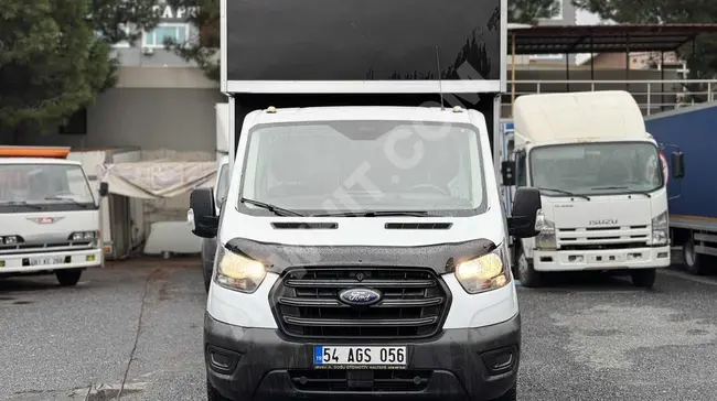 Ford Trucks model 2019 truck without defects with a box for moving furniture 350M with a screen