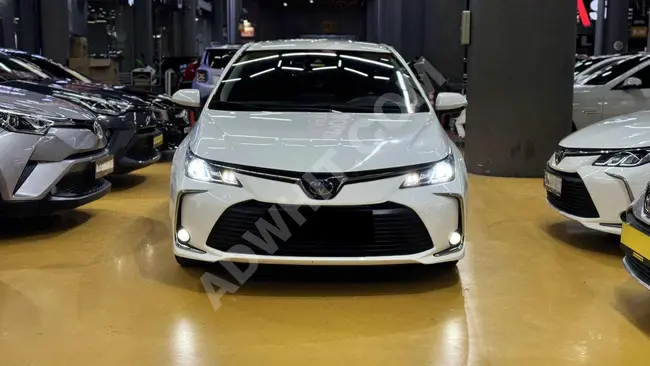 TOYOTA COROLLA HYBRID without defects, paint, or accident history - AUTO BOGATIM