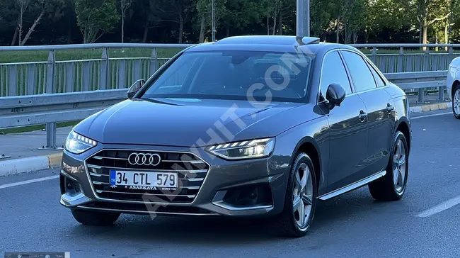 2020 - Audi A4 - مسافة مقطوعة 93.400 كم - فتحة سقف بانورامية - مقاعد جلدية و مدفأة - مرايا قابلة للطي - مقاعد مع مقبس شاحن هاتف - مصابيح LED