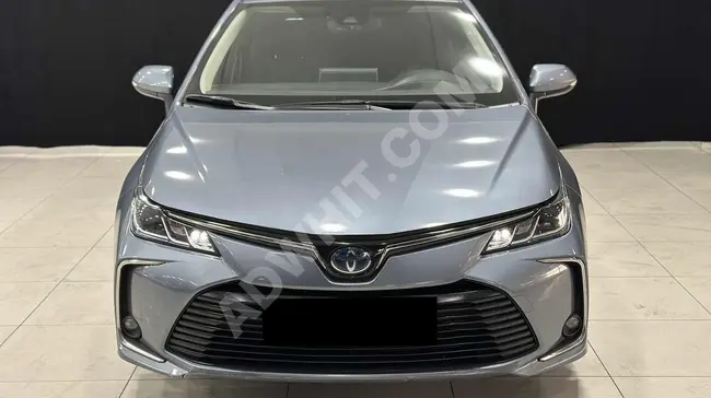 سيارة COROLLA HYBRİD موديل 2021 - بدون أضرار** خدمة فحص ومضمونة