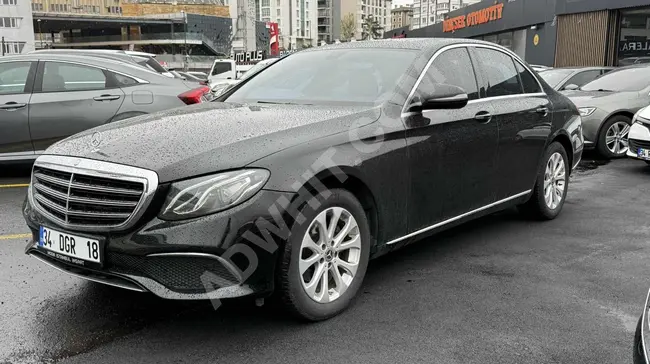 2016 - Mercedes E CLASS - الحزمة الخارجية EXCLUSIVE -   شاشة COMMAND -  سيارة نظيفة و مرتبة