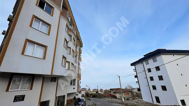 A duplex house consisting of two apartments: a 3+1 and a 2+1, with a separate title deed in KANUNİ.