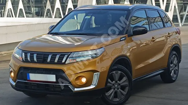 Suzuki Vitara 1.4 hybrid dual color model 2023 with 66,000 km - No defects.