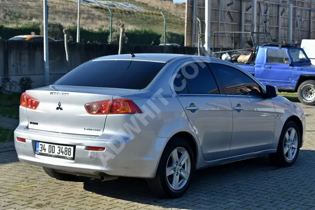 MITSUBISHI LANCER موديل 2009 1.5 INVİTE اوتوماتيك بعداد 46.000 كم الوحيدة في تركيا