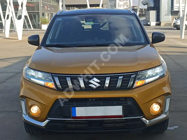 Suzuki Vitara 1.4 hybrid dual color model 2023 with 66,000 km - No defects.