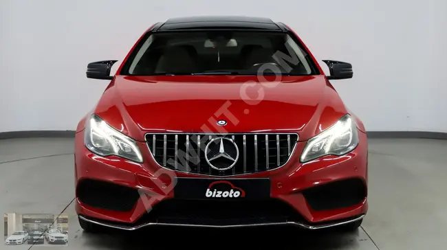 سيارةMERCEDES E250 AMG COUPE  موديل 2015 مع سقف زجاجي، تدفئة وتبريد.