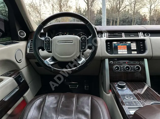 سيار  Range Rover موديل  2015 شاشة ديجيتال + أبواب شفط + داخلية بلونين + نظام صوت MERİDİAN+ إصدار الوكالة