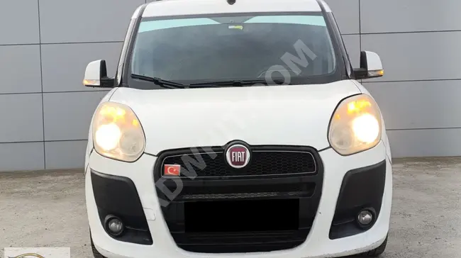 من MNK AUTO، سيارة Fiat Doblo عائلية طويلة تم صيانتها بالكامل - قرض والمقايضة متاحة .