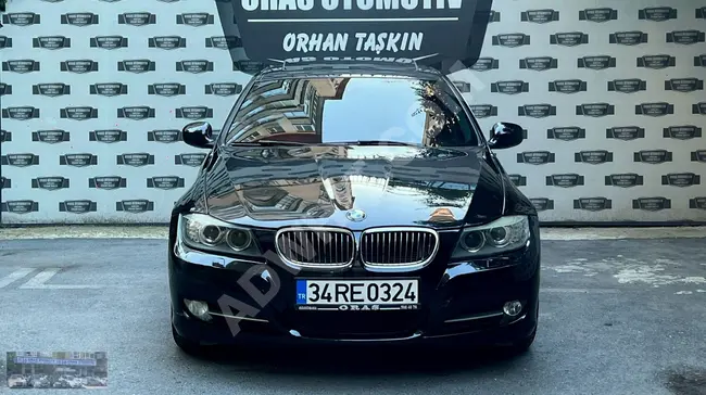 BMW 320d car, 2011 model - with a mileage of 214,000 km, equipped with a sunroof.