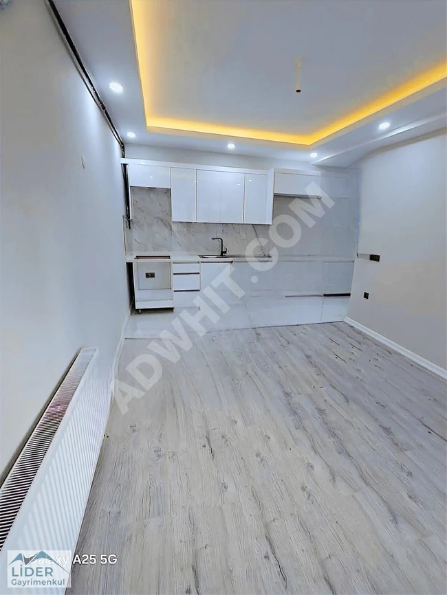 1+1 apartment with an area of 70 square meters, high entrance, for rent in a new building in Yeşilova neighborhood