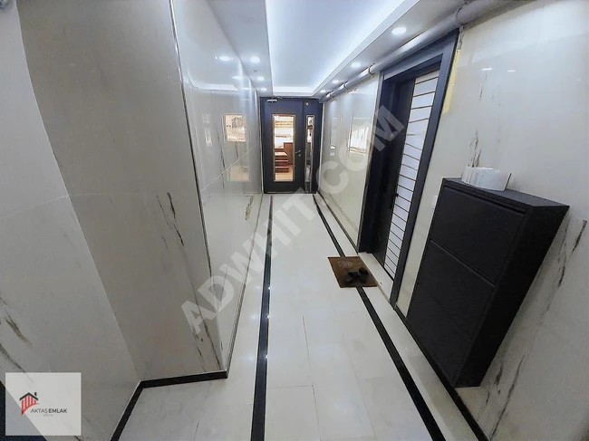 Luxurious 2+1 apartment with an elevator and parking spaces right in the center of AKTAŞ