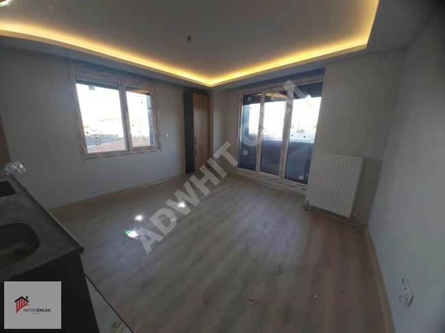 A luxurious 2+1 apartment in a new building with an elevator in the AZİZMAHMUT neighborhood of AKTAŞ.