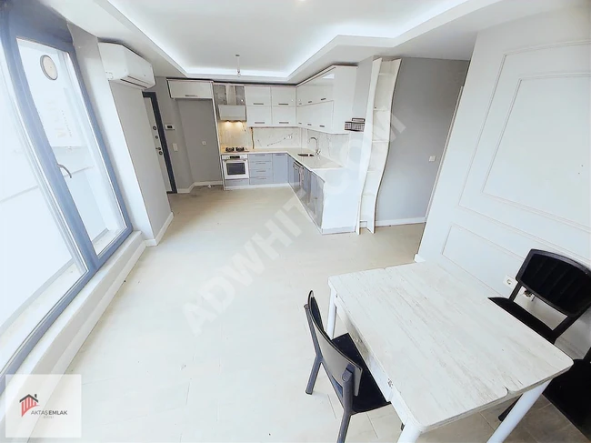 Luxurious 2+1 apartment with an elevator and parking spaces right in the center of AKTAŞ