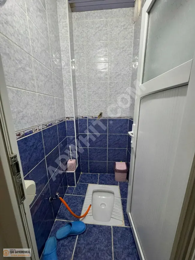 2+1 apartment with high entry for sale in a regular building with IŞIK REAL ESTATE guarantee.