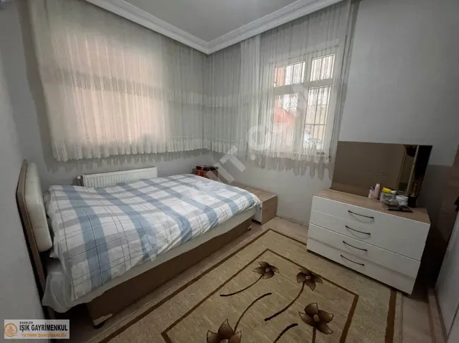 2+1 apartment with high entry for sale in a regular building with IŞIK REAL ESTATE guarantee.