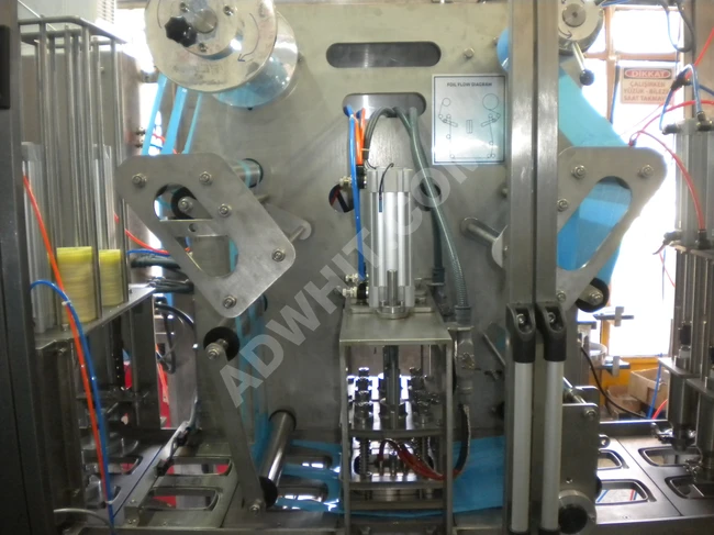 Two-lane cream cheese filling machine.