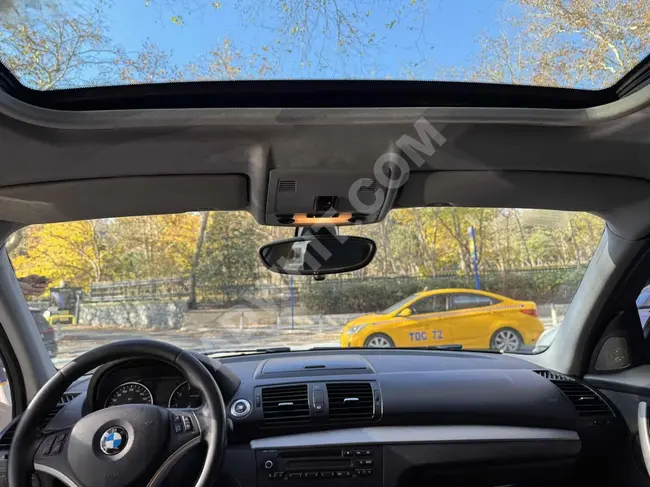 BMW 116 I with a sunroof, automatic transmission AXU MOTORS