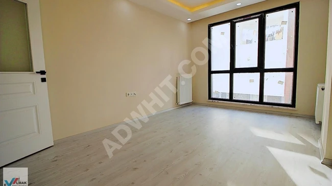 2+1 apartment (80 square meters) on the middle floor with an elevator, spacious in the center of SEFAKÖY.