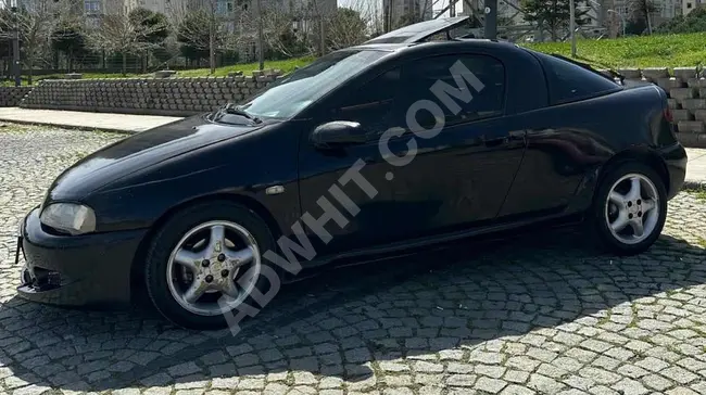 Opel Tigra موديل 1998 للبيع بالسندات بالتقسيط مع إمكانية التبادل مع دراجة نارية من Point motors