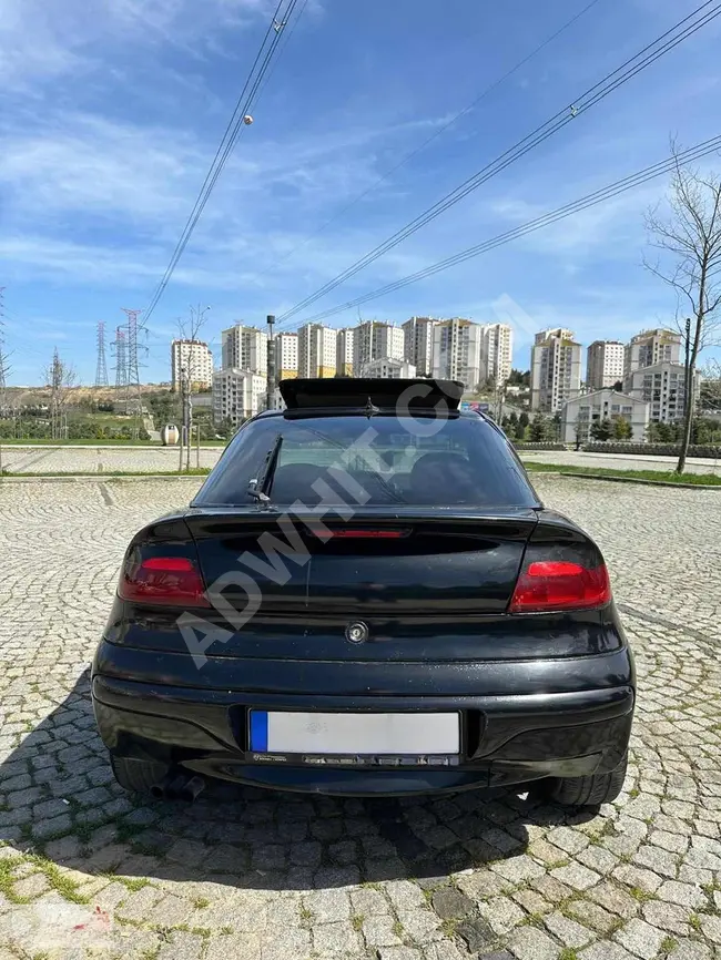 Opel Tigra موديل 1998 للبيع بالسندات بالتقسيط مع إمكانية التبادل مع دراجة نارية من Point motors