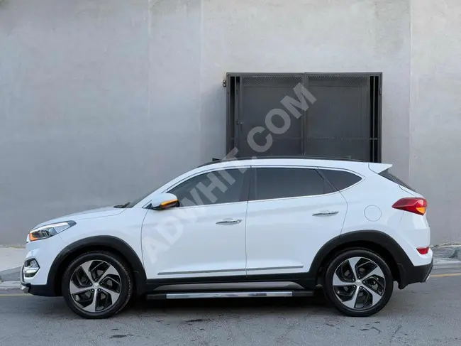 Hyundai Tucson اصدار 2017 بعداد 55.000 كم + 4X4 + سقف زجاجي + تدفئة مقاعد +اكسسورات كاملة