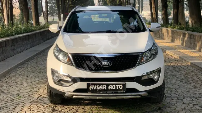 سيارة Kia Sportage  أوتوماتيك 4×2 بمسافة 100 ألف كم بشاشة لوحية